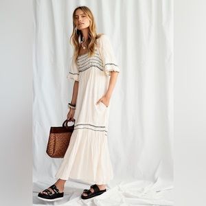 Free People boho dress. Midi length. Cream with black smocking and embroidery.